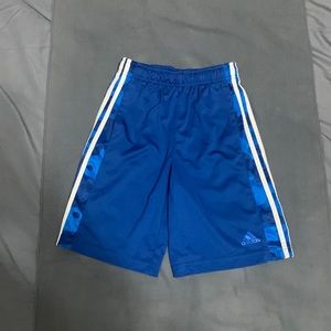 Kids Blue Adidas Climalite shorts.